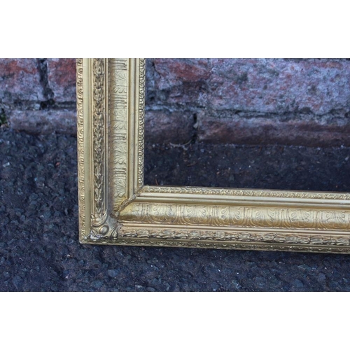 56 - A 19TH CENTURY DECORATIVE GOLD FRAME, with acanthus leaf design to outer edge, frame W 6.5 cm, rebat... 