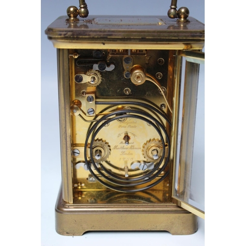 560 - A MATTHEW NORMAN BRASS CARRIAGE CLOCK, the movement numbered '1750', H 14 cm