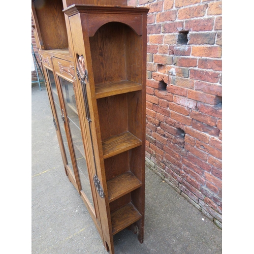 567 - AN EARLY 20TH CENTURY ARTS AND CRAFTS CABINET, having typical copper stylised mounts to the front, w... 