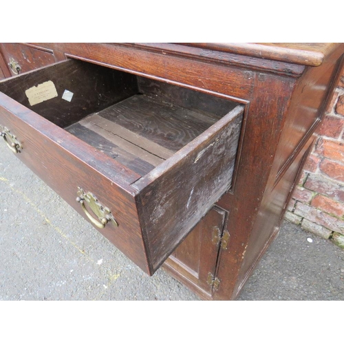 568 - AN 18TH CENTURY OAK WELSH DRESSER, the base with an arrangement of five drawers and two cupboards, a... 