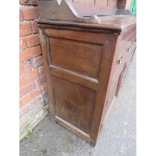 568 - AN 18TH CENTURY OAK WELSH DRESSER, the base with an arrangement of five drawers and two cupboards, a... 