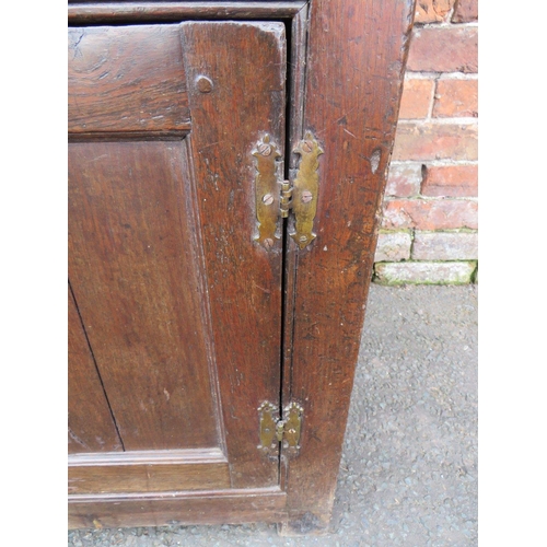 568 - AN 18TH CENTURY OAK WELSH DRESSER, the base with an arrangement of five drawers and two cupboards, a... 