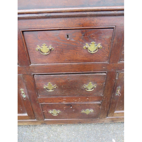 568 - AN 18TH CENTURY OAK WELSH DRESSER, the base with an arrangement of five drawers and two cupboards, a... 