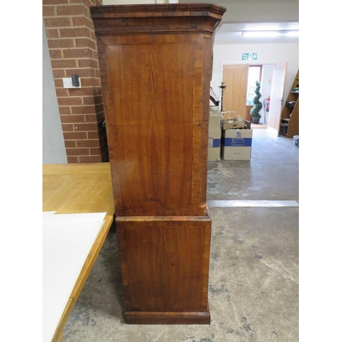 573 - A GEORGE III WALNUT SECRETAIRE TALLBOY, the upper section with three short above three longer gradua... 