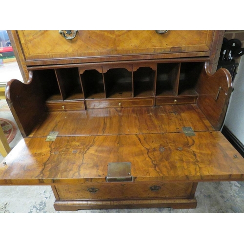 573 - A GEORGE III WALNUT SECRETAIRE TALLBOY, the upper section with three short above three longer gradua... 