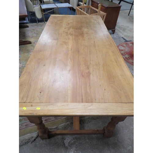 574 - A LATE 19TH CENTURY AND LATER TRADITIONAL STYLE FARMHOUSE TABLE, having a Chestnut plant top with cl... 