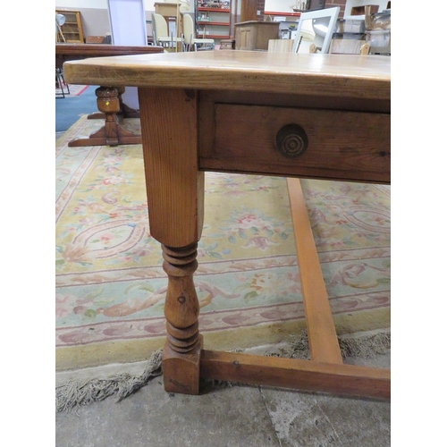 574 - A LATE 19TH CENTURY AND LATER TRADITIONAL STYLE FARMHOUSE TABLE, having a Chestnut plant top with cl... 