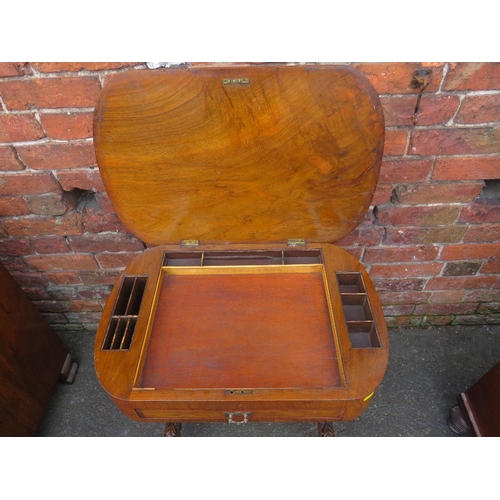 575 - A VICTORIAN WALNUT WORK TABLE, having a hinged top opening to a partially fitted interior above a si... 