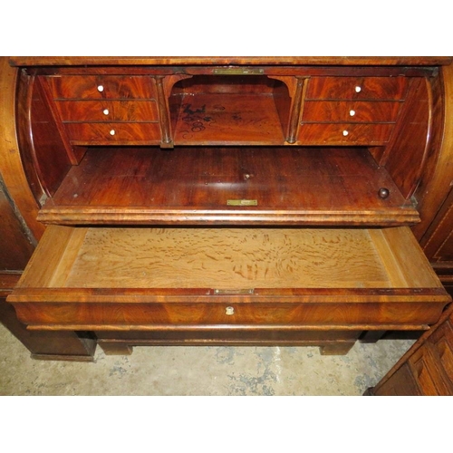 584 - A 19TH CENTURY BIEDERMEIER STYLE MAHOGANY CYLINDER BUREAU HAVING A FITTED INTERIOR,  the pull-out wr... 