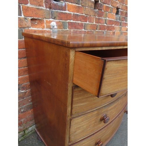 585 - A 19TH CENTURY MAHOGANY BOW FRONTED CHEST OF TWO SHORT ABOVE THREE LONGER GRADUATED DRAWERS, with la... 