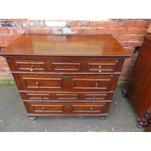 586 - AN ANTIQUE OAK CHEST OF FOUR DRAWERS IN THE JACOBEAN STYLE, each drawer with typical geometric mould... 