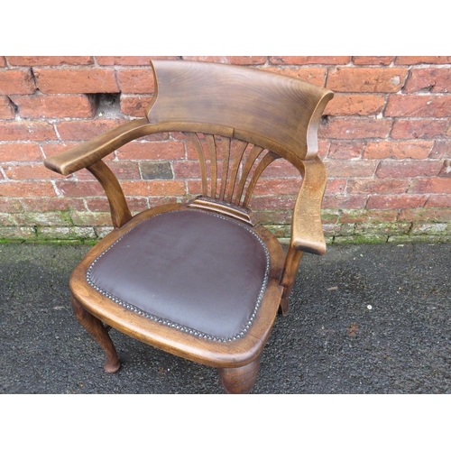 591 - AN EARLY 20TH CENTURY OAK OFFICE ARMCHAIR, with upholstered seat, raised on cabriole supports