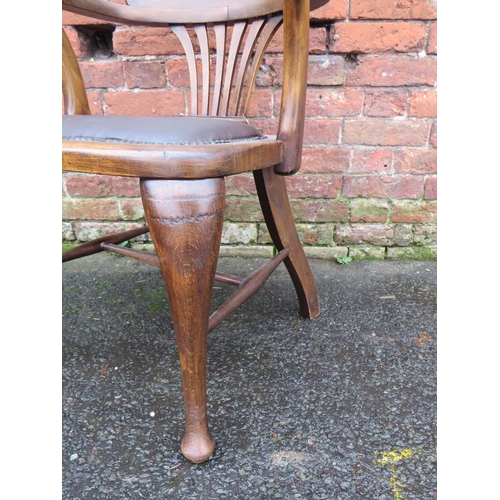 591 - AN EARLY 20TH CENTURY OAK OFFICE ARMCHAIR, with upholstered seat, raised on cabriole supports