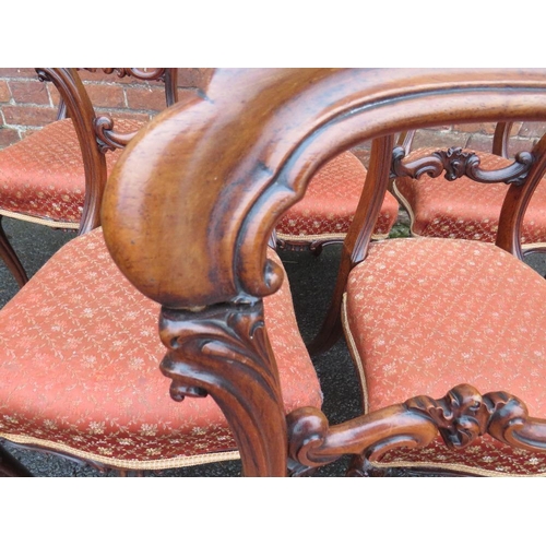 592 - A SET OF SIX MID VICTORIAN MAHOGANY DINING CHAIRS, each with carved detail to the mid-rail, raised o... 