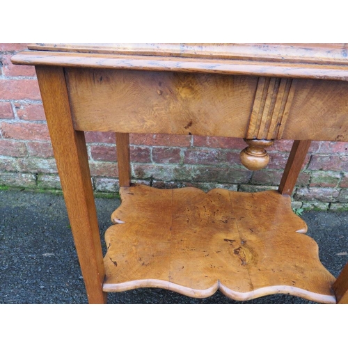 597 - A LATE 19TH CENTURY WALNUT OCCASIONAL TABLE, the stepped rectangular top supported on four outsplaye... 