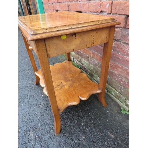 597 - A LATE 19TH CENTURY WALNUT OCCASIONAL TABLE, the stepped rectangular top supported on four outsplaye... 