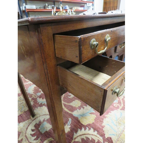 599 - A 19TH CENTURY MAHOGANY LOW BOY, the two plank overhung top above a full length single drawer and tw... 