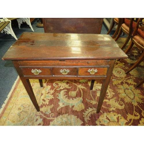 600 - A 19TH CENTURY FRUITWOOD SIDE TABLE, the irregular rectangular overhung top above two small drawers ... 