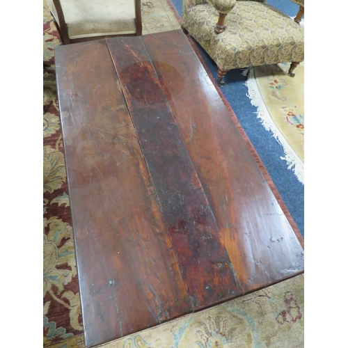 600 - A 19TH CENTURY FRUITWOOD SIDE TABLE, the irregular rectangular overhung top above two small drawers ... 