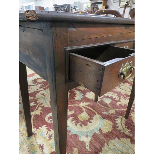 600 - A 19TH CENTURY FRUITWOOD SIDE TABLE, the irregular rectangular overhung top above two small drawers ... 