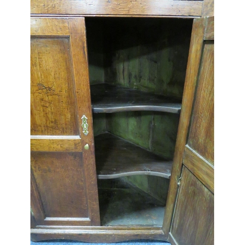 603 - A 19TH CENTURY OAK FLOORSTANDING CORNER CUPBOARD, with four panelled doors, H 210 cm, W 94 cm