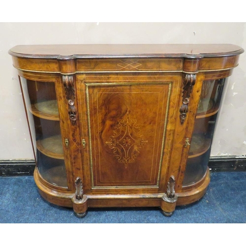 606 - A VICTORIAN WALNUT CREDENZA, having a central inlaid single door flanked by two arched glass cabinet... 