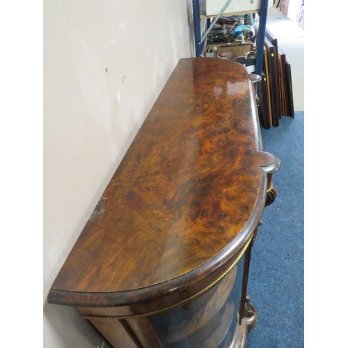 606 - A VICTORIAN WALNUT CREDENZA, having a central inlaid single door flanked by two arched glass cabinet... 