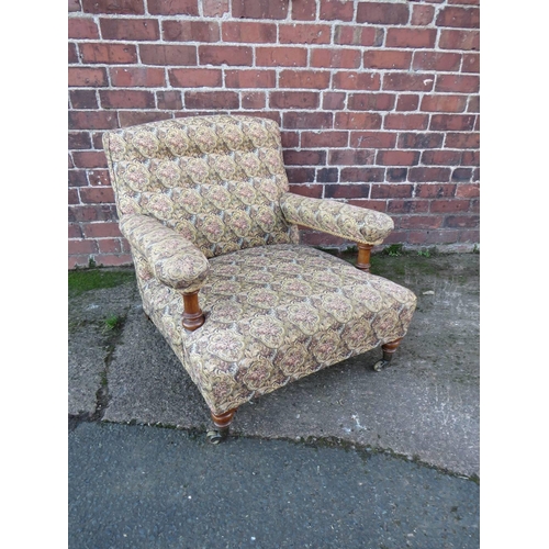 607 - A LARGE UPHOLSTERED OPEN ARMCHAIR, in the style of Howard & Sons, the back leg stamped '4470 4072'