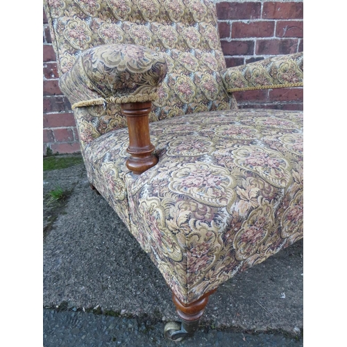 607 - A LARGE UPHOLSTERED OPEN ARMCHAIR, in the style of Howard & Sons, the back leg stamped '4470 4072'