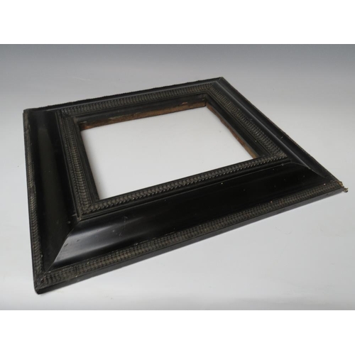 63 - A 19TH CENTURY EBONISED DUTCH FRAME, frame W 8.5 cm, rebate 20 x 25 cm