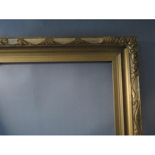 64 - AN EARLY 20TH CENTURY GOLD FRAME WITH LEAF DESIGN TO OUTER EDGE, frame W 8.5 cm, rebate 92 x 61 cm, ... 