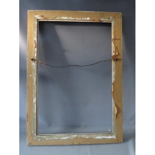 64 - AN EARLY 20TH CENTURY GOLD FRAME WITH LEAF DESIGN TO OUTER EDGE, frame W 8.5 cm, rebate 92 x 61 cm, ... 