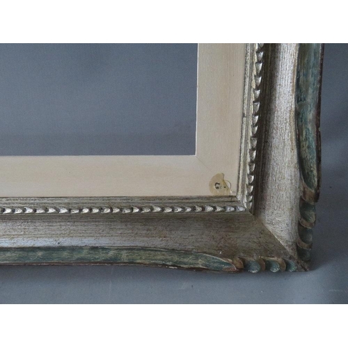 65 - A 20TH CENTURY CARVED WOODEN SILVERED FRAME WITH PAINTED SLIP, frame W 8 cm, slip rebate 80 x 60 cm,... 