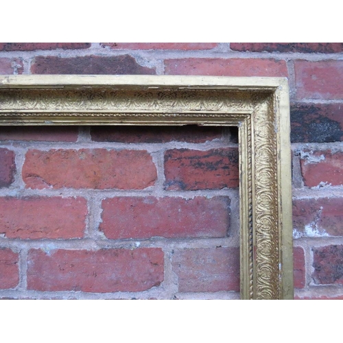 68 - A 19TH CENTURY GOLD FRAME WITH INNER DESIGN, frame W 8.5 cm, rebate 69 x 53 cm