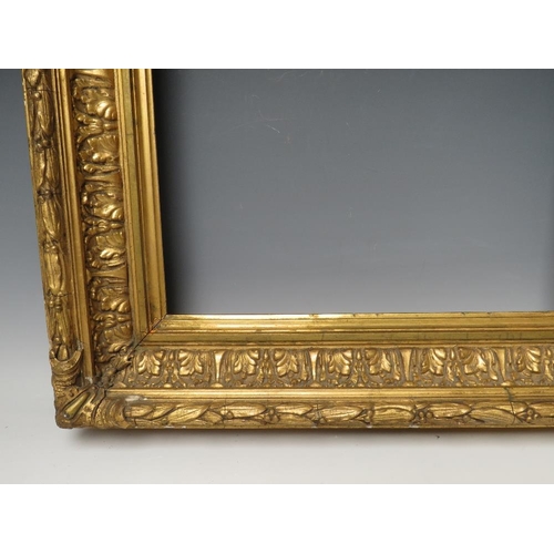 72 - A 19TH CENTURY GOLD FRAME WITH LEAF DESIGN TO INNER EDGE, and acanthus leaf design to outer edge, fr... 