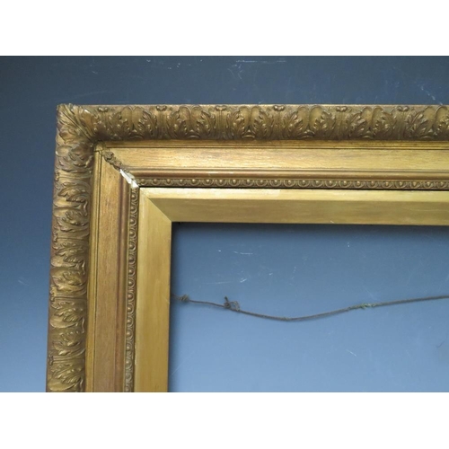 77 - A 19TH CENTURY GOLD WATTS FRAME, with acanthus leaf design to outer edge and gold slip, frame W 8 cm... 