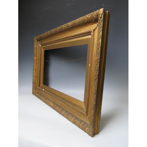 77 - A 19TH CENTURY GOLD WATTS FRAME, with acanthus leaf design to outer edge and gold slip, frame W 8 cm... 