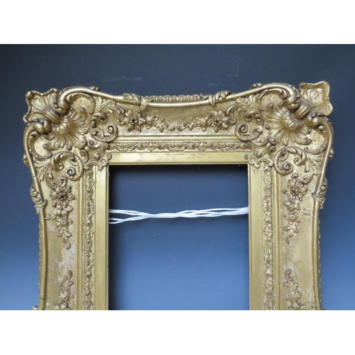 80 - A LATE 18TH / EARLY 19TH CENTURY GOLD SWEPT FRAME, frame W 16 cm, frame rebate 42 x 33 cm