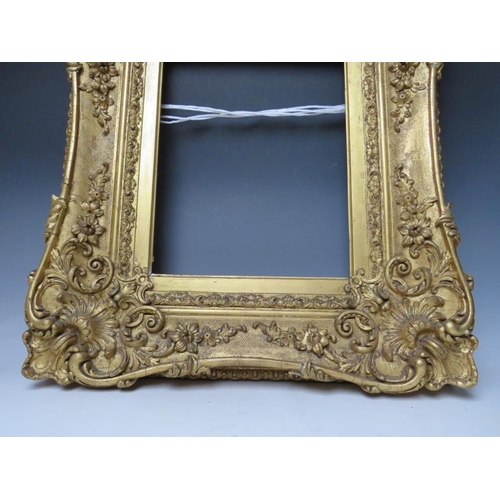 80 - A LATE 18TH / EARLY 19TH CENTURY GOLD SWEPT FRAME, frame W 16 cm, frame rebate 42 x 33 cm