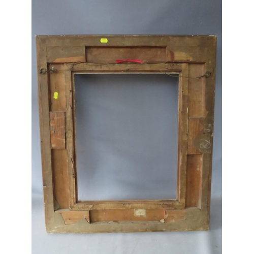 81 - A 19TH CENTURY DECORATIVE GOLD SWEPT FRAME, with gold slip, frame W 10.5 cm, slip rebate 51 x 41 cm,... 