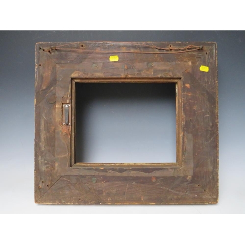 84 - AN 18TH CENTURY GOLD HINGED CABINET FRAME, with acanthus leaf design, frame W 11 cm, rebate 25 x 31 ... 