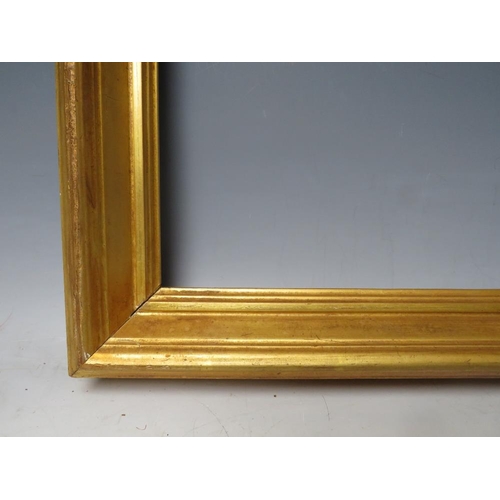 86 - A 19TH CENTURY PLAIN GOLD FRAME, frame E 5.5 cm, rebate 25 x 31 cm