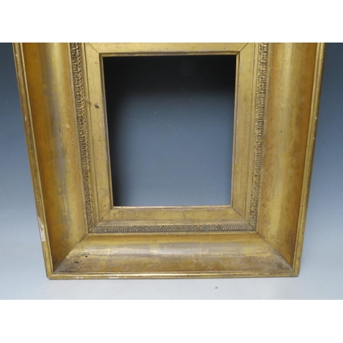 87 - AN 18TH CENTURY GOLD FRAME, with design to inner edge, frame W 10 cm, rebate 27 x 23 cm