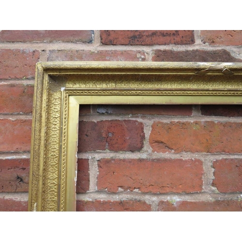 88 - A 19TH CENTURY GOLD FRAME, with inner design and gold slip, frame W 7.5 cm, slip rebate 72 x 59 cm, ... 