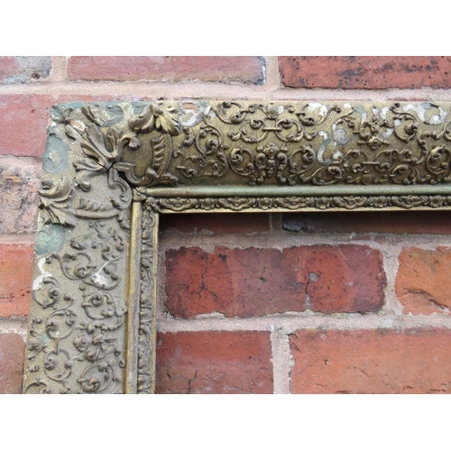 89 - AN 18TH CENTURY DECORATIVE GOLD FRAME FOR RESTORATION, frame W 9 cm, rebate 77 x 60 cm