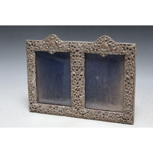 372 - A HALLMARKED PIERCED SILVER DOUBLE PHOTO FRAME - BIRMINGHAM 1903, W 28 cm