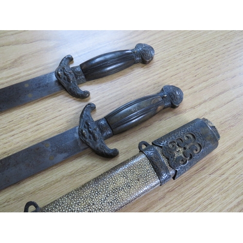 500 - VINTAGE CHINESE TWIN BLADED SWORDS IN ONE SCABBARD, the scabbard covered in shagreen and decorative ... 