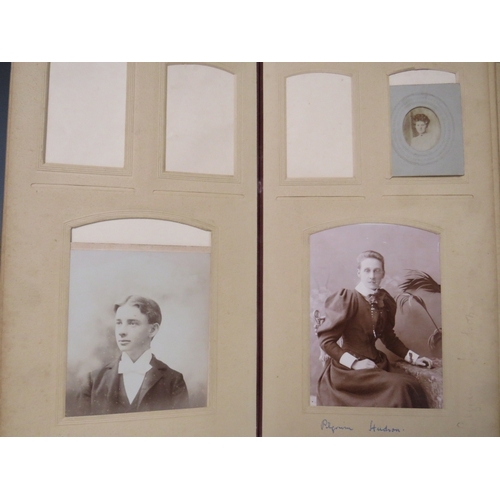 527 - A PHOTOGRAPH ALBUM DATED 1916 ON INNER COVER, with mixed media painting of a young woman in classica... 