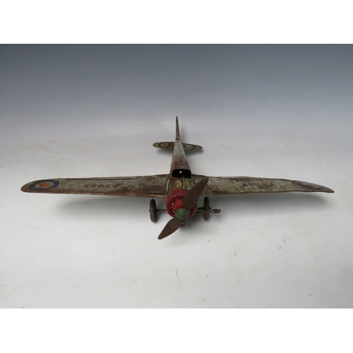 546 - A VINTAGE CLOCKWORK TIN PLATE PROPELLER AEROPLANE, with retractable wings, L 30 cm, W 43 cm with win... 