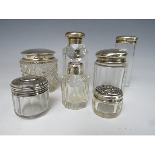 196 - A COLLECTION OF HALLMARKED SILVER LIDDED VANITY JARS, tallest H 16 cm, together with a small silver ... 